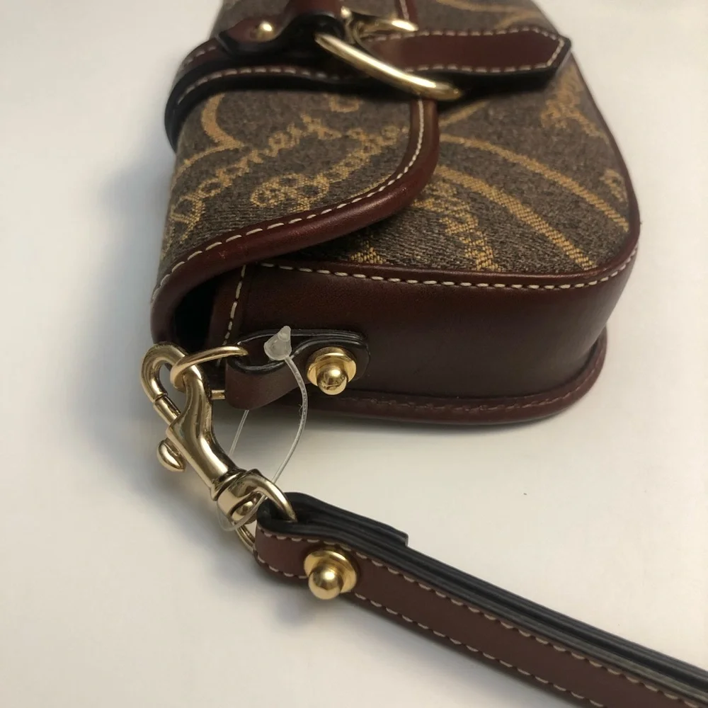 Dooney & Bourke vintage flap wristlet